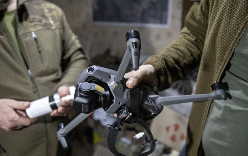 KOSTYANTYNIVKA, DONETSK OBLAST, UKRAINE, MARCH 05: Ukrainian servicemen IT engineers work on adapting civilian drones for using them as modified military devices in the battlefield at a workroom as the Russia-Ukraine war enters its 3rd year in Kostiantynivka, Donetsk Oblast, Ukraine on March 5, 2024. Narciso Contreras / Anadolu (Photo by Narciso Contreras / ANADOLU / Anadolu via AFP)