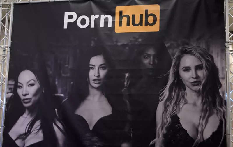 LAS VEGAS, NEVADA - JANUARY 06: A sign hangs at the Pornhub booth at the 2023 AVN Adult Entertainment Expo at Resorts World Las Vegas on January 06, 2023 in Las Vegas, Nevada.   Ethan Miller/Getty Images/AFP (Photo by Ethan Miller / GETTY IMAGES NORTH AMERICA / Getty Images via AFP)