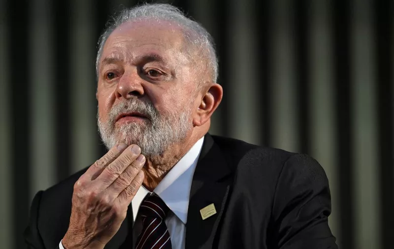 Brazil's President Luiz Inacio Lula da Silva attends a ceremony of announcements of investments in Brazil, Paraguay, and Bolivia on the second day of the Mercosur summit in Rio de Janeiro, Brazil, on December 7, 2023. Mercosur will receive Bolivia as a full member and will sign a trade agreement with Singapore, the first with an Asian country, when it meets at a summit this Thursday in Rio, with the bitter taste of not having closed its negotiations with the EU. (Photo by MAURO PIMENTEL / AFP)