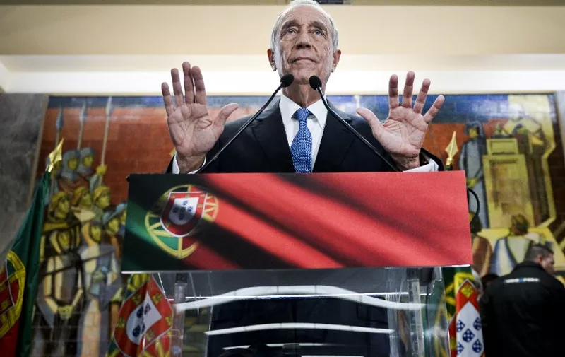 Marcelo Rebelo de Sousa gestures as he delivers a speech after winning the Portugal's Presidencial Election in Lisbon on January 24, 2016. A 67-year-old law professor and TV pundit, Marcelo Rebelo de Sousa, was the clear winner today in Portugal's presidential election, with over 52 percent of the vote, according to a nearly-complete count.   AFP PHOTO / PATRICIA DE MELO MOREIRA / AFP / PATRICIA DE MELO MOREIRA