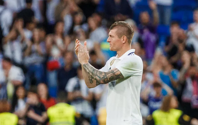 Real Madrid's Toni Kroos applauds the fans at the end of a Spanish La Liga soccer match between Real Madrid and Almeria at the Santiago Bernabeu stadium in Madrid, Spain, Saturday, April 29, 2023. (AP Photo/Pablo Garcia)