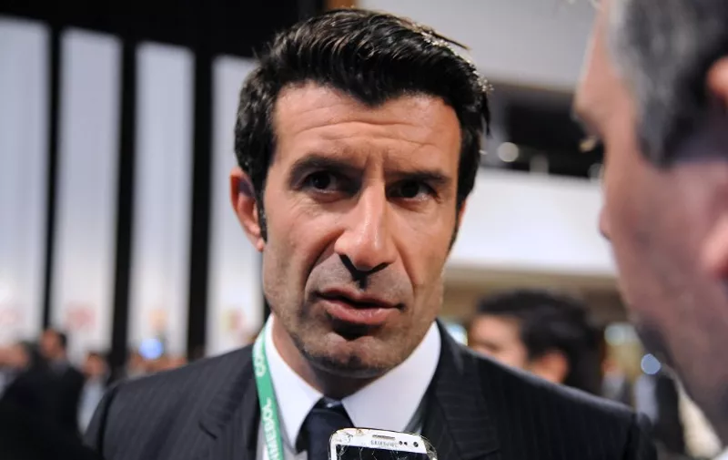 FIFA presidential hopeful Luis Figo speaks to the press during the 65th Ordinary Congress of the CONMEBOL, at the South American confederation's headquarters in Luque, near Asuncion on March 4, 2015.   AFP PHOTO / 