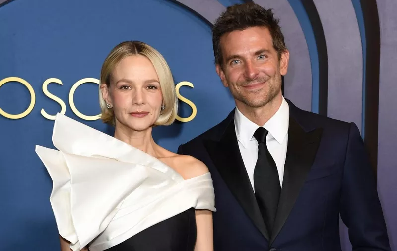 English actress Carey Mulligan (L) and US actor and director Bradley Cooper arrive for the Academy of Motion Picture Arts and Sciences' 14th Annual Governors Awards at the Ray Dolby Ballroom in Los Angeles on January 9, 2024. (Photo by VALERIE MACON / AFP)