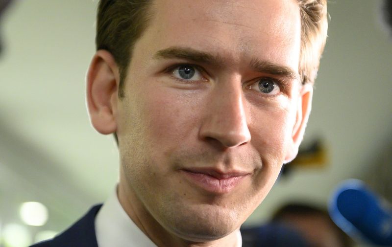 Austrian People's party (OeVP) head Sebastian Kurz speaks to journalists as he arrives for the election debate at public broadcaster television ORF in Vienna, Austria on September 26, 2019. - Austria will hold snap elections on September 29, 2019 after sensational hidden-camera footage plunged the OeVP's coalition partner, the far-right Freedom Party (FPOe) into a corruption scandal and brought the government down. (Photo by JOE KLAMAR / AFP)