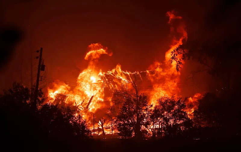 8/19/2020 - Vacaville, California, USA: A house is engulfed in flames along Pleasant Valley Road during LNU Lightning Complex Fire in Vacaville, Calif., on Wednesday, August 19, 2020.,Image: 553828165, License: Rights-managed, Restrictions: No publication in scandal publications, Model Release: no