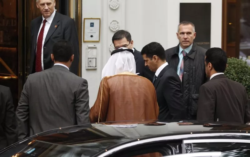 Saudi Minister of Foreign Affairs ?Adel bin Ahmed Al-Jubeir (C) arrives for a meeting with his counterparts from USA, Russia and Turkey to discuss the Syrian conflict on October 23, 2015 in Vienna. 
AFP PHOTO / DIETER NAGL