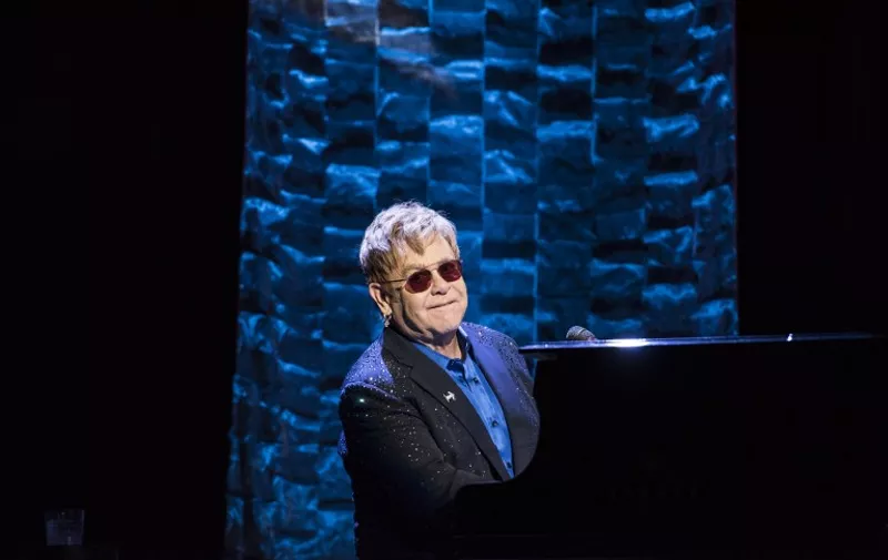 NEW YORK, NY - MARCH 2: Elton John performs during a fundraiser for Democratic presidential candidate Hillary Clinton at Radio City Music Hall on March 2, 2016 in New York City. Clinton won seven states in yesterday's Super Tuesday.   Andrew Renneisen/Getty Images/AFP