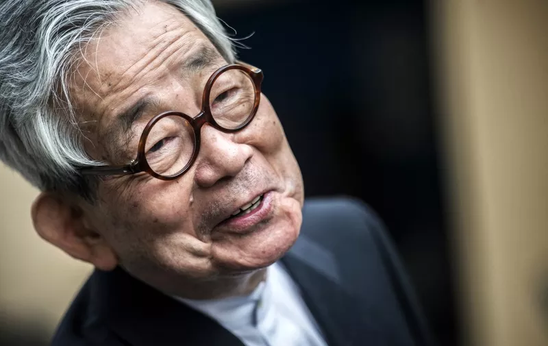 Japanese author and 1994 Nobel Prize for literature lauriate Kenzaburo Oe, looks on as he participates in the International Forum of the Novel 2015 on May 25, 2015 in Lyon. AFP PHOTO / JEFF PACHOUD (Photo by Jeff PACHOUD / AFP)