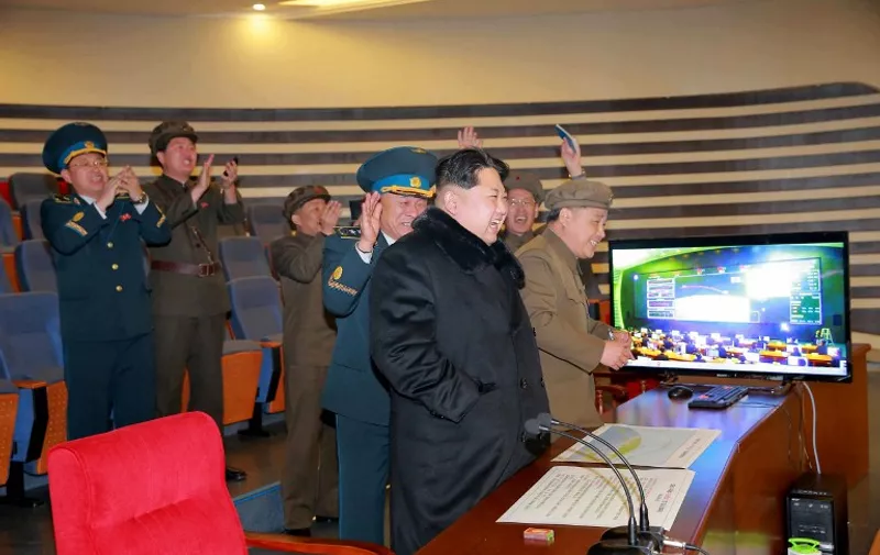 This picture released by North Korea's official Korean Central News Agency (KCNA) on February 7, 2016 shows North Korean leader Kim Jong-Un (C) attending the rocket launch of the earth observation satellite Kwangmyong 4 at an undisclosed location in North Korea. North Korea hailed an "epochal event" but its latest long-range rocket launch on February 7 prompted international anger and plans for talks on a US missile defence system for the peninsula. REPUBLIC OF KOREA OUT AFP PHOTO / KCNA via KNS 
 
THIS PICTURE WAS MADE AVAILABLE BY A THIRD PARTY. AFP CAN NOT INDEPENDENTLY VERIFY THE AUTHENTICITY, LOCATION, DATE AND CONTENT OF THIS IMAGE. THIS PHOTO IS DISTRIBUTED EXACTLY AS RECEIVED BY AFP.     ---EDITORS NOTE--- RESTRICTED TO EDITORIAL USE - MANDATORY CREDIT "AFP PHOTO/KCNA VIA KNS" - NO MARKETING NO ADVERTISING CAMPAIGNS - DISTRIBUTED AS A SERVICE TO CLIENTS / AFP / KCNA / KCNA VIA KNS