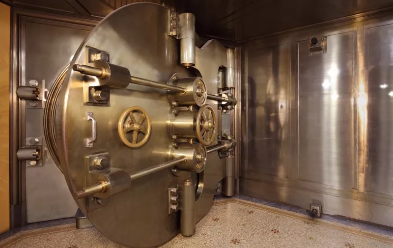 Open door to the bank safe in the basement of the registered head office of Societe Generale, at 29 Boulevard Haussmann in the 9th arrondissement of Paris, France. The 2.76m wide circular door was made by Fichet at the Creusot forges and installed in 1912. It leads to an armoured access drum and a second reinforced door, behind which are the 4 levels of the safe. The bank was founded in 1864 and these buildings were transformed 1906-12 by Jacques Hermant, and in use from 1915. Societe Generale remains one of the largest banks in the world, although its headquarters are now at La Defense. The Haussmann building is listed as a historic monument. Picture by Manuel Cohen (Photo by Manuel Cohen / Manuel Cohen / Manuel Cohen via AFP)