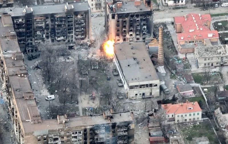 Aerial footage released by the Ukraine's Azov Regiment on April 12, 2022 shows Russian tanks are destroyed by the regiment in streets of besieged Mariupol in southeastern. Ukraine. Over 10,000 civilians have been killed in the southeastern Ukrainian city of Mariupol, a number that could eventually double, the city's mayor Vadym Boychenko said on Monday, as Russian forces close in on the key city ahead of a larger offensive in eastern Ukraine. Capturing Mariupol is likely a key priority for Russia. The city could form part of a land bridge connecting Russia's mainland with the Russian-annexed Crimean Peninsula, and it lies within eastern Ukraine's Donetsk region, which borders Russia and has been partially controlled by pro-Russian separatists since 2014.
Mariupol Battle kills over 10,000 residents, Ukraine - 12 Apr 2022,Image: 682397774, License: Rights-managed, Restrictions: , Model Release: no, Credit line: Profimedia