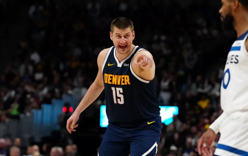 Apr 10, 2024; Denver, Colorado, USA; Denver Nuggets center Nikola Jokic (15) calls out in the second half against the Minnesota Timberwolves at Ball Arena. Mandatory Credit: Ron Chenoy-USA TODAY Sports