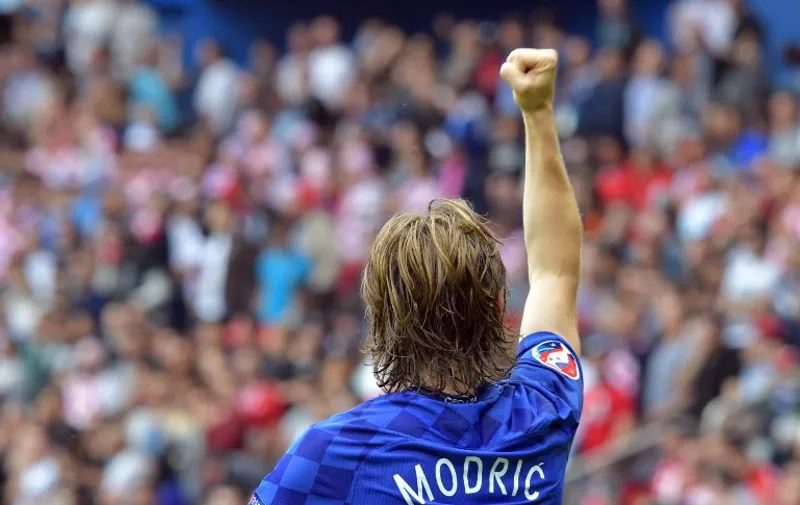 Luka Modric of Croatia celebrates after scoring his side's first goal during the UEFA Euro 2016 Group D soccer match between Turkey and Croatia in the Parc de Princes stadium in Paris, June 12, 2016. Photo: Peter Kneffel/dpa (RESTRICTIONS APPLY: For editorial news reporting purposes only. Not used for commercial or marketing purposes without prior written approval of UEFA. Images must appear as still images and must not emulate match action video footage. Photographs published in online publications (whether via the Internet or otherwise) shall have an interval of at least 20 seconds between the posting.)