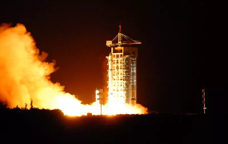 China's quantum satellite - nicknamed Micius after a 5th century BC Chinese scientist - blasts off from the Jiuquan satellite launch centre in China's northwest Gansu province on August 16, 2016.
China launched the world's first quantum satellite on August 16, state media reported, in an effort to harness the power of particle physics to build an "unhackable" system of encrypted communications. / AFP PHOTO / STR / China OUT