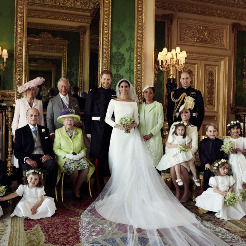 A picture released by Kensington Palace on behalf of The Duke and Duchess of Sussex on May 21, 2018 shows Britain's Prince Harry, Duke of Sussex, (CL) and his wife Meghan, Duchess of Sussex, (CR) posing for an official wedding photograph with (L-R back row) Britain's Camilla, Duchess of Cornwall, Britain's Prince Charles, Prince of Wales, Doria Ragland, the Duchess of Sussex's mother, Britain's Prince William, Duke of Cambridge, (middle row L-R): Master Jasper Dyer, Britain's Prince Philip, Duke of Edinburgh, Britain's Queen Elizabeth II, Britain's Catherine, Duchess of Cambridge, Princess Charlotte of Cambridge, Prince George of Cambridge, Miss Rylan Litt, Master John Mulroney and (front row) Miss Ivy Mulroney, Master Brian Mulroney, Miss Florence van Cutsem, Miss Zalie Warren and Miss Remi Litt in the Green Drawing Room, Windsor Castle, in Windsor on May 19, 2018.  / AFP PHOTO / KENSINGTON PALACE / Alexi Lubomirski / RESTRICTED TO EDITORIAL USE - MANDATORY CREDIT "AFP PHOTO / THE DUKE AND DUCHESS OF SUSSEX / ALEXI LUBOMIRSKI " - NO MARKETING NO ADVERTISING CAMPAIGNS - NO COMMERCIAL USE - NO SALES - RESTRICTED TO SUBSCRIPTION USE - NO USE IN SOUVENIRS OR MEMORABILIA - NO CROPPING, ENHANCING OR DIGITAL MODIFICATION - NOT TO BE USED AFTER DECEMBER 31, 2018 - DISTRIBUTED AS A SERVICE TO CLIENTS

 / The erroneous mention[s] appearing in the metadata of this photo by Alexi Lubomirski has been modified in AFP systems in the following manner: [A picture released by Kensington Palace on behalf of The Duke and Duchess of Sussex on May 21, 2018 shows Britain's Prince Harry, Duke of Sussex, (CL) and his wife Meghan, Duchess of Sussex, (CR) posing for an official wedding photograph with (L-R back row) Britain's Camilla, Duchess of Cornwall, Britain's Prince Charles, Prince of Wales, Doria Ragland, the Duchess of Sussex's mother, Britain's Prince William, Duke of Cambridge, (middle row L-R): Master Jasper Dyer, Britain's Prince Philip, Duke of Edinburgh, Britain's Queen Elizab
