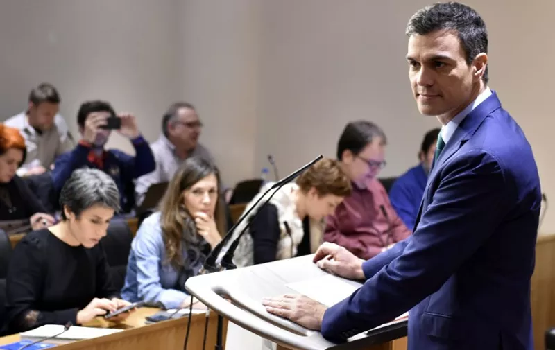 Spanish Socialist Party (PSOE) leader Pedro Sanchez (R) gives a press conference after his meeting with Spain's acting Prime Minister at the Spanish parliament in Madrid on February 12, 2016.   
Spain has been plunged in political uncertainty since December 20 elections put an end to the long-established two-party, conservative-socialist system with the emergence of Podemos and Ciudadanos, resulting in a parliament fractured along four main groupings that makes any government formation difficult.  / AFP / GERARD JULIEN