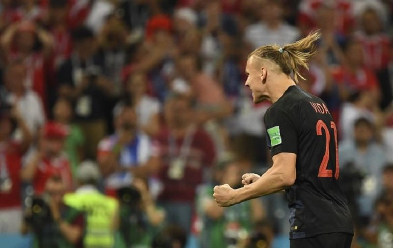 Croatia's defender Domagoj Vida celebrates his shot during the penalty shootout during the Russia 2018 World Cup quarter-final football match between Russia and Croatia at the Fisht Stadium in Sochi on July 7, 2018. / AFP PHOTO / Kirill KUDRYAVTSEV / RESTRICTED TO EDITORIAL USE - NO MOBILE PUSH ALERTS/DOWNLOADS