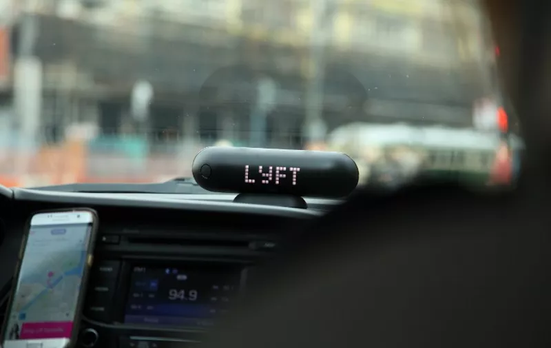 SAN FRANCISCO, CA - JANUARY 31: An Amp syncs with the Lyft driver app on January 31, 2017 in San Francisco, California.   Kelly Sullivan/Getty Images for Lyft/AFP
