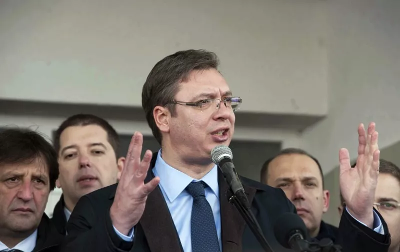 Serbian Prime Minister Aleksandar Vucic gives an address during his visit to the village of Pasjane, in Kosovo on January 14, 2015. Vucic launched a highly symbolic Orthodox New Year visit to Kosovo, the former Serbian province that unilaterally seceded in 2008 despite Belgrade's fierce opposition. AFP PHOTO/ARMEND NIMANI