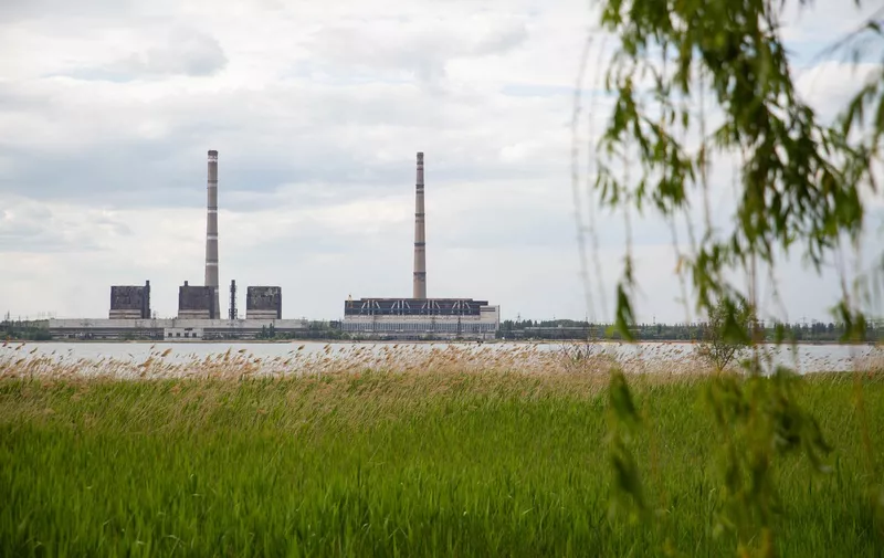 DONETSK REGION, UKRAINE - MAY 25, 2022: A view of the Vuhlehirska power station in the city of Svitlodarsk. On May 24, the troops of the Russian Armed Forces, the LPR and the DPR People’s Militia took the control over Svitlodarsk. The Russian Armed Forces are carrying out a special military operation in Ukraine in response to requests from the leaders of the Donetsk People's Republic and the Lugansk People's Republic. Alexander Reka/TASS,Image: 694611656, License: Rights-managed, Restrictions: , Model Release: no, Credit line: Profimedia