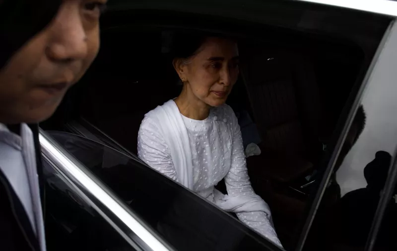 (FILES) In this file photo taken on August 17, 2017 Myanmar's State Counselor Aung San Suu Kyi leaves after attending the funeral service for the National League for Democracy (NLD) party's former chairman Aung Shwe in Yangon. - Myanmar's military has detained the country's de facto leader Aung San Suu Kyi and the country's president in a coup, a spokesman for her ruling party said February 1, 2021. (Photo by AUNG Kyaw Htet / AFP)