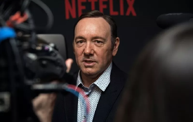 (FILES): This file photo taken on February 23, 2016 shows actor Kevin Spacey arriving for  the season 4 premiere screening of the Netflix show "House of Cards" in Washington, DC. 
Kevin Spacey came out as gay early Monday, October 30, 2017 and apologized to actor Anthony Rapp, who accused the Hollywood star of making a sexual advance on him at a 1986 party when he was only 14 years old. Spacey's announcement, posted to his Twitter account at midnight, came after Rapp -- best known for being part of the original cast of Broadway hit "Rent" -- made the accusation in an interview with Buzzfeed News.
 / AFP PHOTO / Nicholas Kamm