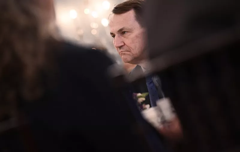 Polish Foreign Minister Radoslaw Sikorski listens during a meeting with US Secretary of State Antony Blinken at the US State Department in Washington, DC, on February 26, 2024. (Photo by Brendan SMIALOWSKI / AFP)