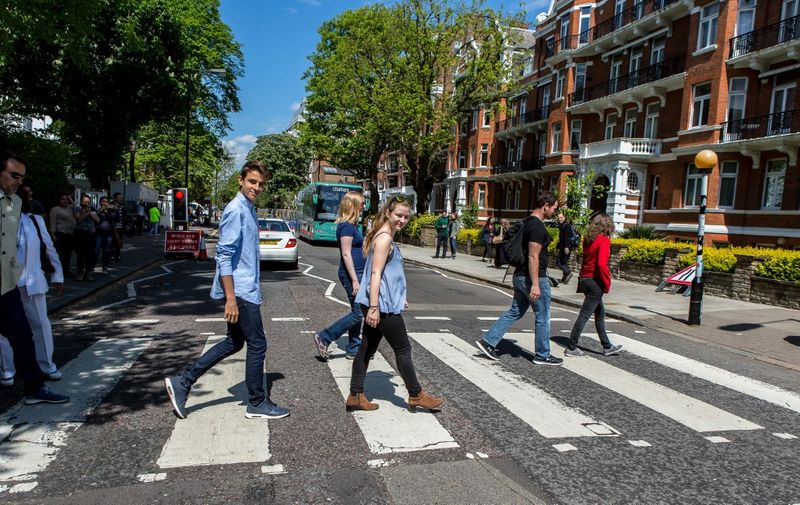 UNITED KINGDOM. ENGLAND. LONDON. ABBEY ROAD. CROSSWALK THAT ILLUSTRATES THE COVER OF THE LAST ALBUM OF THE FAB FOUR (THIS IS THE ONLY NATIONALLY RANKED HERITAGE) (Photo by STEPHANE FRANCES / ONLY WORLD / Only France via AFP)