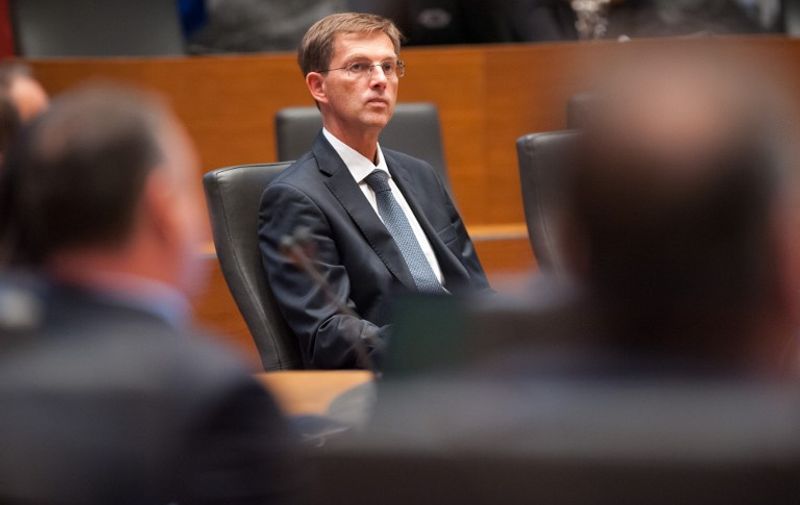 Slovenia's Prime Minister Miro Cerar looks on before the parliament appointed his new centre-left government in Ljubljana, Slovenia, on September 18, 2014. Slovenian newly appointed centre-left Prime Minister Miro Cerar announced a restrictive financial policy and further privatisations as parliament approved his cabinet today. The 16-member cabinet was approved with 54 against 25 votes in the 90-seat parliament. Six MPs abstained. AFP PHOTO / Jure Makovec