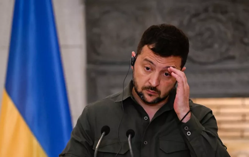 Ukraine's President Volodymyr Zelensky reacts during a joint press conference with Greece's Prime Minister Kyriakos Mitsotakis (not pictured) after their meeting in Athens on August 21, 2023. Ukrainian President Volodymyr Zelensky has landed in Athens for an official visit, the Greek prime minister's office said, and would later join an informal dinner with EU and Balkans leaders.
Greece has been a strong supporter of Ukraine since Russia's invasion, providing humanitarian aid and weapons including infantry fighting vehicles, Kalashnikov assault rifles, launchers and ammunition. (Photo by Aris MESSINIS / AFP)