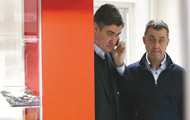 12.12.2015., Zagreb - Zoran Milanovic razgovarao na mobitel u sredisnjici SDP-a uoci odrzavanja sjednice Glavnog odbora SDP-a.
Photo: Robert Anic/PIXSELL