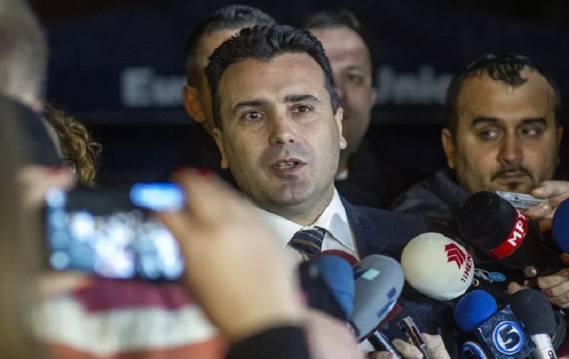 The leader of Macedonia's biggest opposition party SDSM, Zoran Zaev (C) talks to the media in Skopje on January 16, 2016. 
EU Commissioner Johannes Hahn said in press statement that the negotiations between the four biggest political parties on implementing last year's political agreement have failed. Macedonia's Prime Minister Nikola Gruevski handed in his resignation on January 15, paving the way for an early election in April in line with an EU-brokered deal to end a political crisis. The move came as Hahn arrived in Skopje to encourage political parties to stick to the agreement reached in July last year, which was designed to end months of turmoil in the Balkan nation of about 2.1 million people.  / AFP PHOTO / Robert ATANASOVSKI