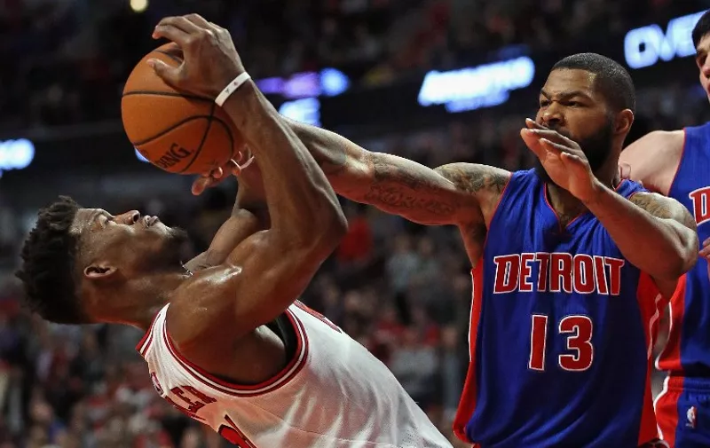 CHICAGO, IL - DECEMBER 18: Marcus Morris #13 of the Detroit Pistons blocks a shot by Jimmy Butler #21 of the Chicago Bulls at the United Center on December 18, 2015 in Chicago, Illinois. The Pistons defeated the Bulls 147-144 in quadruple overtime. NOTE TO USER: User expressly acknowledges and agrees that, by downloading and or using the photograph, User is consenting to the terms and conditions of the Getty Images License Agreement.   Jonathan Daniel/Getty Images/AFP
