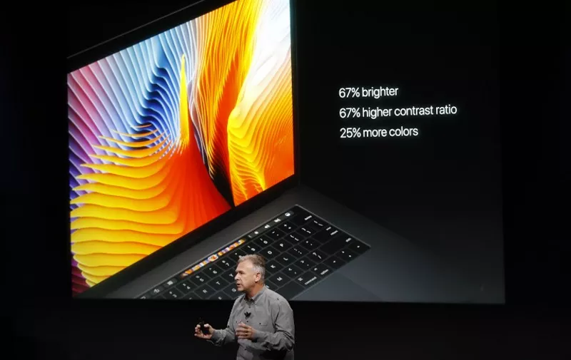 CUPERTINO, CA - OCTOBER 27: Apple Senior Vice President of Worldwide Marketing Phil Schiller introduces the all-new MacBook Pro during a product launch event on October 27, 2016 in Cupertino, California. Apple Inc. is expected to unveil the latest iterations of its MacBook line of laptops   Stephen Lam/Getty Images/AFP