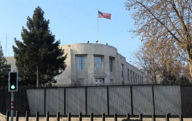 A picture taken on December 20, 2016 shows the US Embassy in Ankara, closed for the day after a shooting incident overnight outside the American embassy in Ankara that followed the assassination of the Russian ambassador in the Turkish capital. 
"An individual approached the US Embassy Ankara main gate and discharged a firearm," the embassy said in a statement, adding no-one was hurt and the individual was detained. ?As a result, the embassy and consulates in Istanbul and Adana were closed for normal operations, it added.
 / AFP PHOTO / ADEM ALTAN