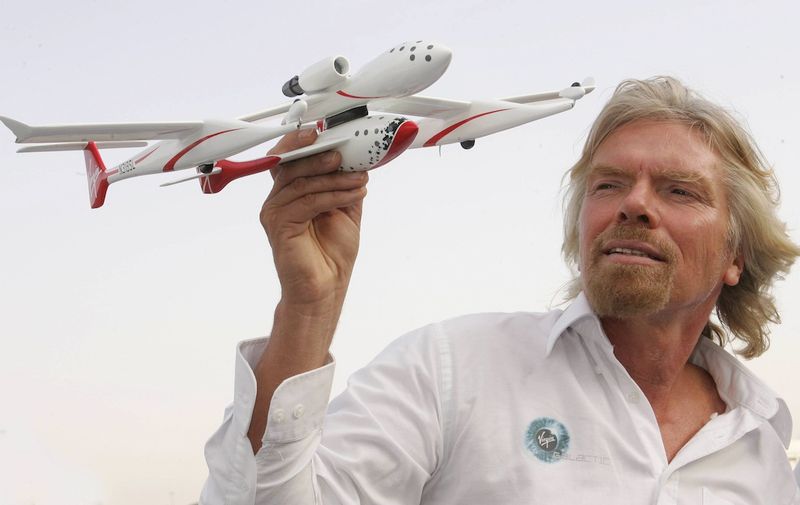 British Virgin company Chairman Sir Richard Branson poses 29 March 2006 in Dubai with a model of a SpaceshipOne a commercial space shuttle with which he hopes to operate the first commercial space travel service at the end of 2008. Branson was promoting his company venture during a press conference in Dubai. AFP PHOTO/CARL DE [&hellip;]