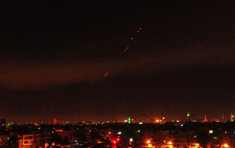 April 14, 2018 - Damascus, Syria - Surface-to-air missiles are seen over Syria's capital Damascus as the Syrian air defenses were responding to U.S. attacks. The U.S. started military actions against Damascus before daybreak Saturday as loud explosions were heard with ''red dots'' seen flying from earth to the sky., Image: 368487683, License: Rights-managed, Restrictions: , Model Release: no, Credit line: Profimedia, Zuma Press - News