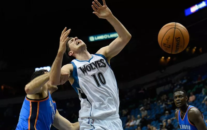 MINNEAPOLIS, MN - OCTOBER 7: Damjan Rudez #10 of the Minnesota Timberwolves reacts to a foul by Nick Collison #4 of the Oklahoma City Thunder during the fourth quarter of the preseason game on October 7, 2015 at Target Center in Minneapolis, Minnesota. The Thunder defeated Timberwolves 122-99. NOTE TO USER: User expressly acknowledges and agrees that, by downloading and or using this Photograph, user is consenting to the terms and conditions of the Getty Images License Agreement.   Hannah Foslien/Getty Images/AFP