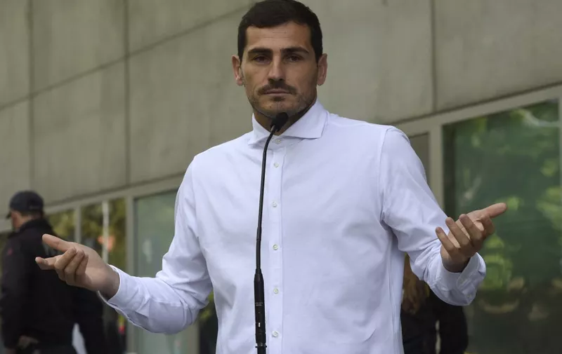 Porto's Spanish goalkeeper Iker Casillas addresses journalists after leaving a hospital in Porto on May 6, 2019 after recovering from a heart attack. - The 37-year-old Spanish soccer legend Iker Casillas left a Portuguese hospital today, where he entered on May 1, 2019 after suffering a myocardial infarction during a training session with Porto and emotionally declared that he doesn't know what his life will be like from now on. (Photo by Miguel RIOPA / AFP)