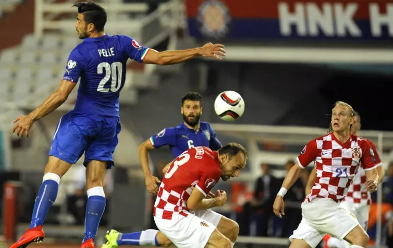 Italia's forward Graziano Pelle (L) vies with Croatia's defenders Gordon Schildenfeld (C) and Domagoj Vida (R)  during the Euro 2016 qualifying football match between Croatia and Italy on June 12, 2015 at the Poljud stadium in Split. AFP PHOTO