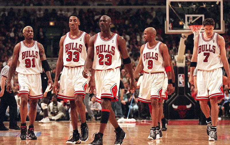 April 24, 1998 &#8211; Chicago, IL, USA &#8211; From left, Dennis Rodman, Scottie Pippen, Michael Jordan, Ron Harper and Toni Kukoc were big parts of Bulls teams that won three straight NBA titles from 1996 to 1998. Jordan and Pippen were members of the first &#8221;three-peat&#8221; team, which won titles from 1991 to 1993., Image: [&hellip;]
