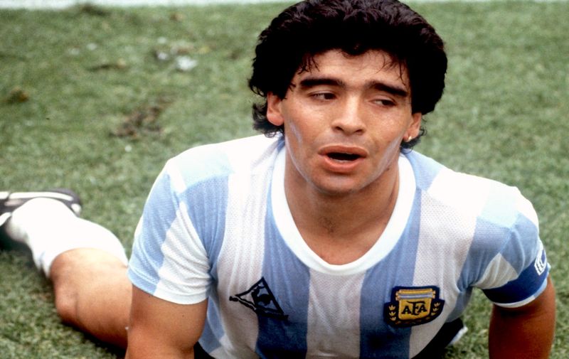 Diego Maradona, Argentina&#8217;s midfield star, goalgetter and team captain is lying on the field at Mexico City&#8217;s Olympic Stadium during the 1986 FIFA World Cup in Mexico. Argentina beats Bulgaria 2:0 at a group match.