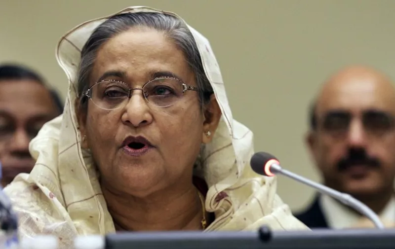 Bangladeshi Prime Minister Sheikh Hasina addresses a High-level Summit on Strengthening International Peace Operations during the 69th session of the United Nations General Assembly at United Nations headquarters in New York on September 26, 2014.  AFP PHOTO/POOL/ANDREW GOMBERT