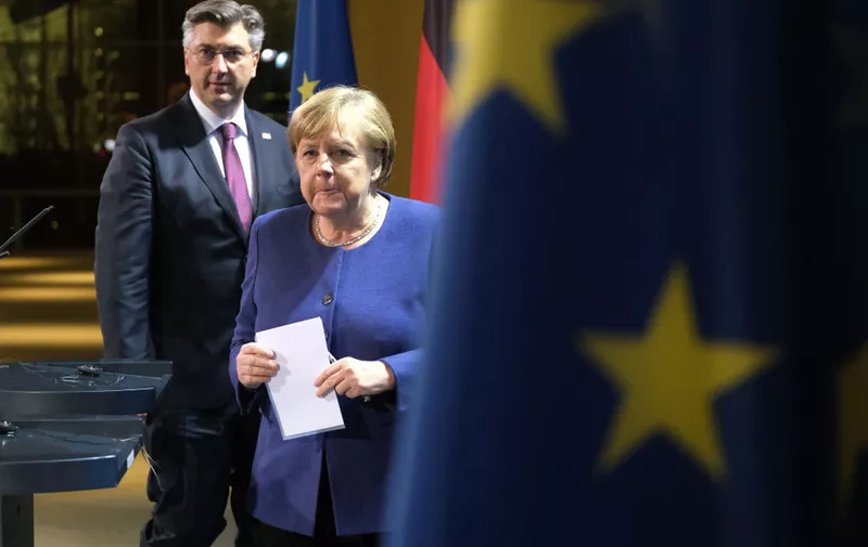 BERLIN, GERMANY - JANUARY 16: German Chancellor Angela Merkel and Croatian Prime Minister Andrej Plenkovic arrive to speak to the media following talks at the Chancellery on January 16, 2020 in Berlin, Germany. Croatia currently holds the rotating presidency of the Council of the European Union.  (Photo by Sean Gallup/Getty Images)