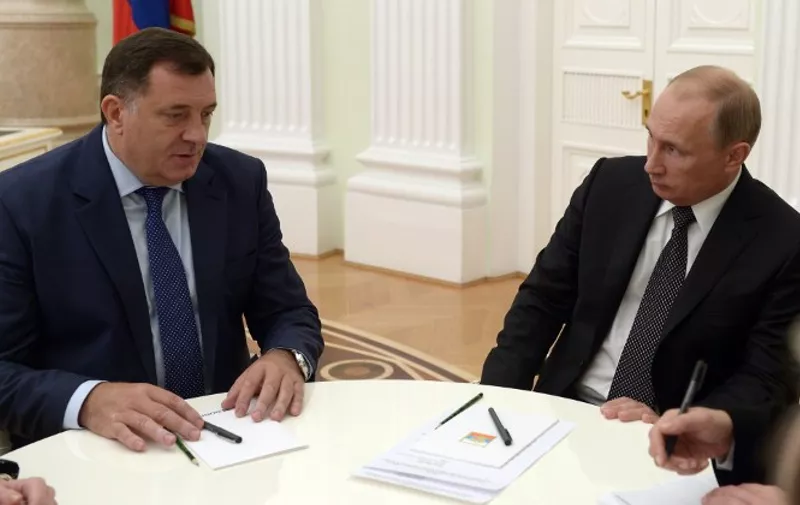 Russian President Vladimir Putin (R) meets with the president of Bosnia's Serb entity "Republika Srpska" Milorad Dodik, at the Kremlin in Moscow, on September 18, 2014. AFP PHOTO / RIA NOVOSTI / KREMLIN POOL / ALEKSEY NIKOLSKYI