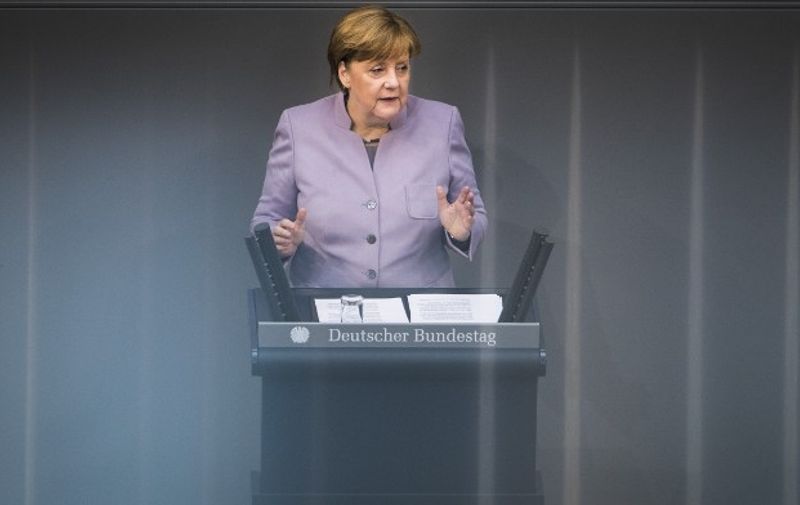 German Chancellor Angela Merkel delivers a speech on Europe at the Bundestag, the German lower house of parliament ahead of a EU summit in Brussels on April 27, 2017 in Berlin.
German Chancellor Angela Merkel on Thursday told Britain not to have any "illusions" that it would have the same rights as an EU member after it leaves the bloc. / AFP PHOTO / Odd ANDERSEN