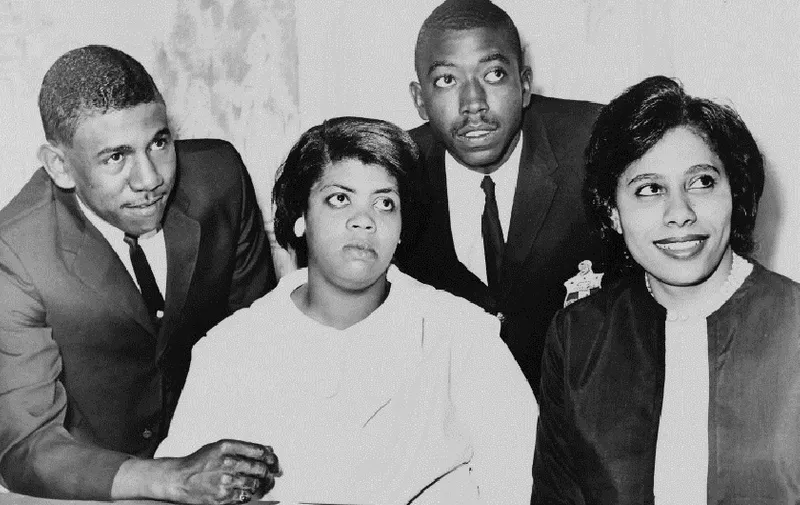 (FILES): This 1964 handout photograph obtained courtesy of the Library of Congress shows Linda Brown (C), who was at the center of the 1950s court battle that led to the desegregation of US schools, has died, the organization that spearheaded the landmark legal effort said Monday, March 26, 2018. 
The US Supreme Court ruling on the Brown v. Board of Education case in 1954 was a key moment in the movement to end widespread discriminatory practices against black people in the United States, but discrimination, racism and racial tensions still plague the country more than 60 years later. "Linda Brown, lead plaintiff in our landmark Brown v. Board of Education case, has died," the National Association for the Advancement of Colored People's Legal Defense Fund said on Twitter. While the NAACP said Brown was 76 at the time of her death, her age was elsewhere reported to have been 75. The organization did not provide details on what caused her death. / AFP PHOTO / Library of Congress / Library of Congress / == RESTRICTED TO EDITORIAL USE  / MANDATORY CREDIT:  "AFP PHOTO /  LIBRARY OF CONGRESS / HANDOUT" / NO MARKETING / NO ADVERTISING CAMPAIGNS /  DISTRIBUTED AS A SERVICE TO CLIENTS  ==