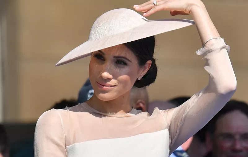 Britain's Meghan, Duchess of Sussex, attends the Prince of Wales's 70th Birthday Garden Party at Buckingham Palace in London on May 22, 2018. - The Prince of Wales and The Duchess of Cornwall hosted a Garden Party to celebrate the work of The Prince's Charities in the year of Prince Charles's 70th Birthday. (Photo by Dominic Lipinski / POOL / AFP)