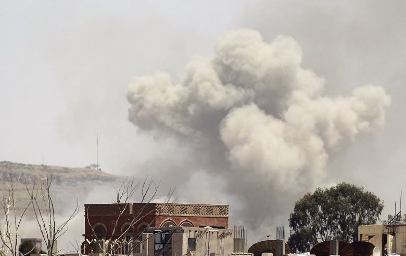 Smoke rises above the Alhva camp, east of the Yemeni capital, Sanaa, on April 17, 2015, following an alleged air strike by the Saudi-led alliance on Shiite Huthi rebels camps. Yemen&#8217;s President Abedrabbo Mansour Hadi fled the country for Riyadh as the rebels supported by Iran advanced south, provoking the Saudi-led coalition to begin air [&hellip;]
