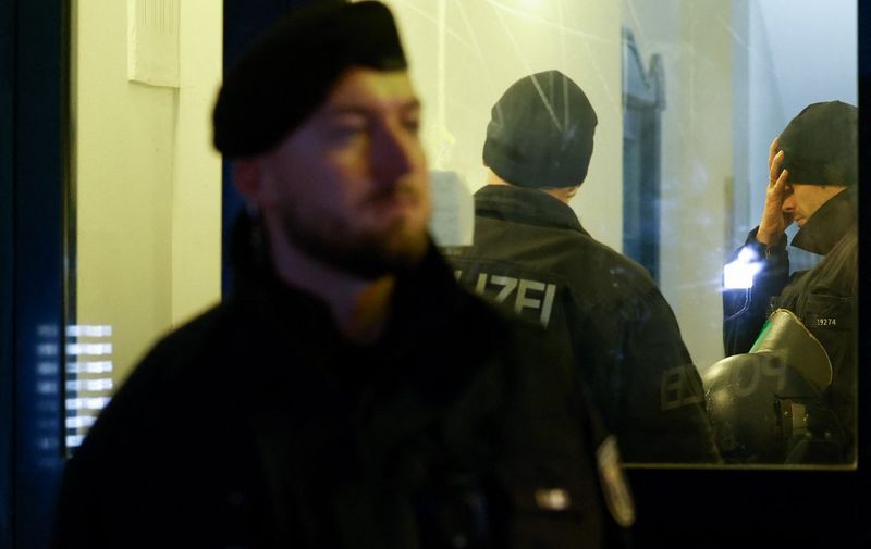 Police conduct a search of an appartment in Berlin's Friedrichshain district on March 3, 2024 during an ongoing manhunt for two members of the far-left militant Baader-Meinhof gang, who had been on the run for more than 30 years. Police continuted the search for Ernst-Volker Staub, 69, and Burkhard Garweg, 55, from the radical anti-capitalist group also known as the Red Army Faction (RAF). The search for the two men had intensified in the last days, after Monday's arrest of Daniela Klette, 65, the third member of the long-sought-after trio from RAF. (Photo by Odd ANDERSEN / AFP)